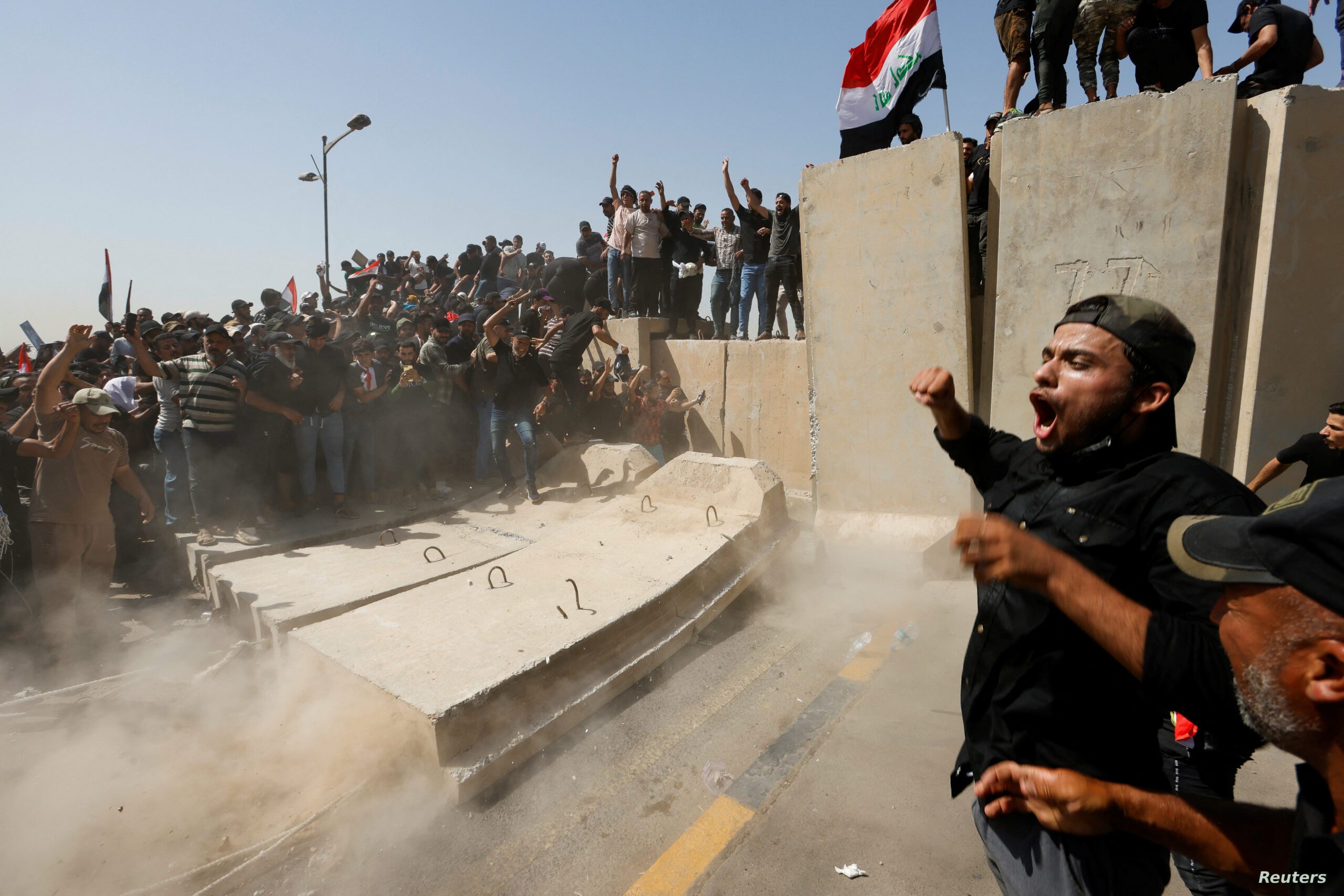 Supporters of Iraqi Shi’ite cleric Moqtada al-Sadr protest against corruption, in Baghdad