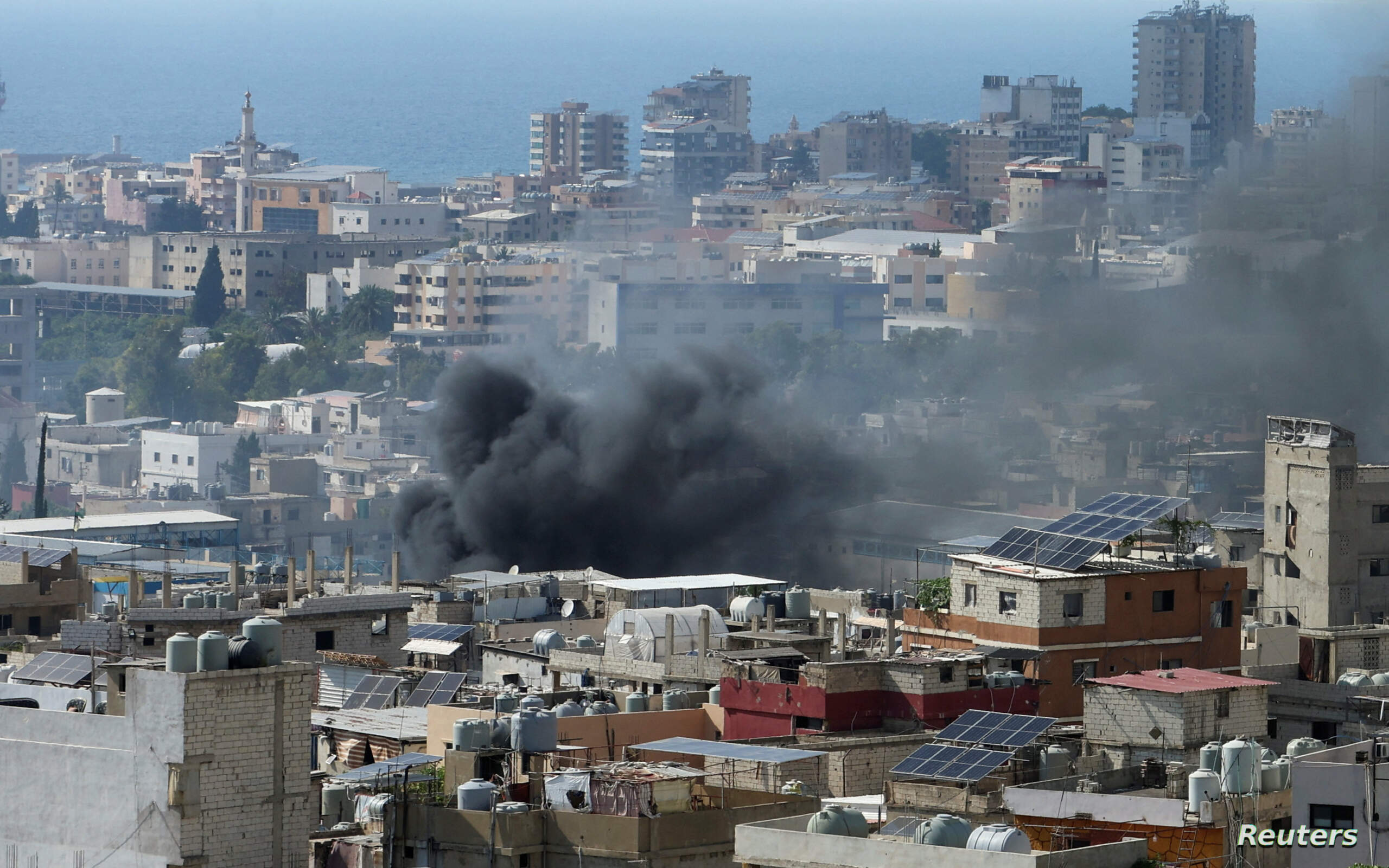 Smoke rises from Ain el-Hilweh Palestinian refugee camp