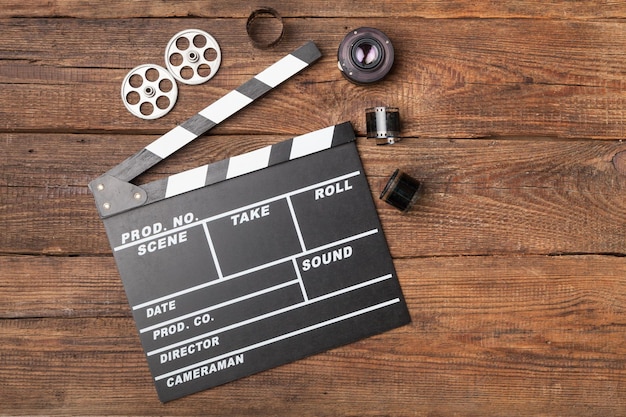 vintage-classic-clapperboard-lenses-brown-wooden-table_488220-51485 خاص- إلغاء تصوير هذا المسلسل …