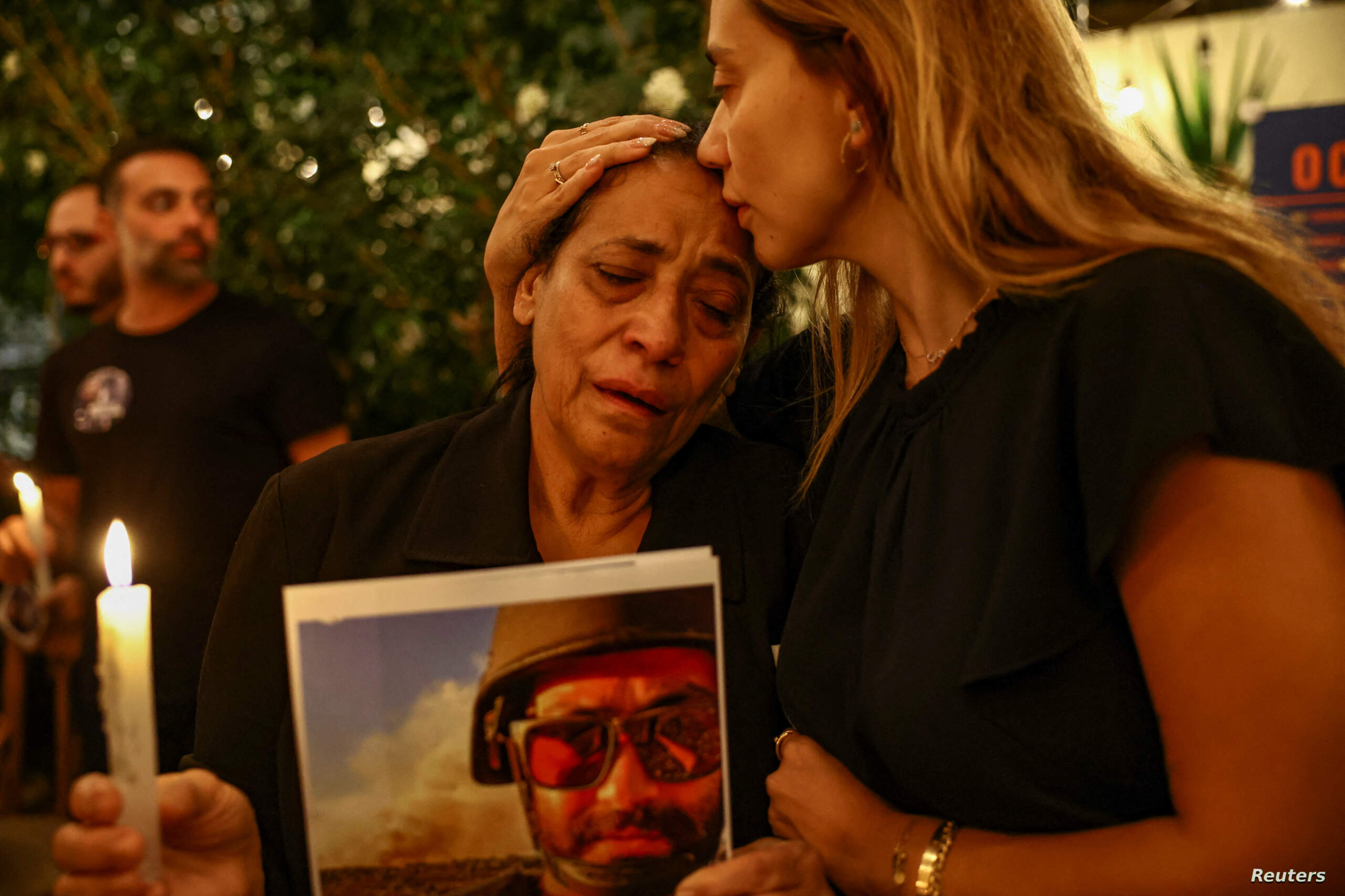 Friends and relatives hold a candlelight vigil in Beirut to mark one week since the killing of Reuters video journalist Issam Abdallah