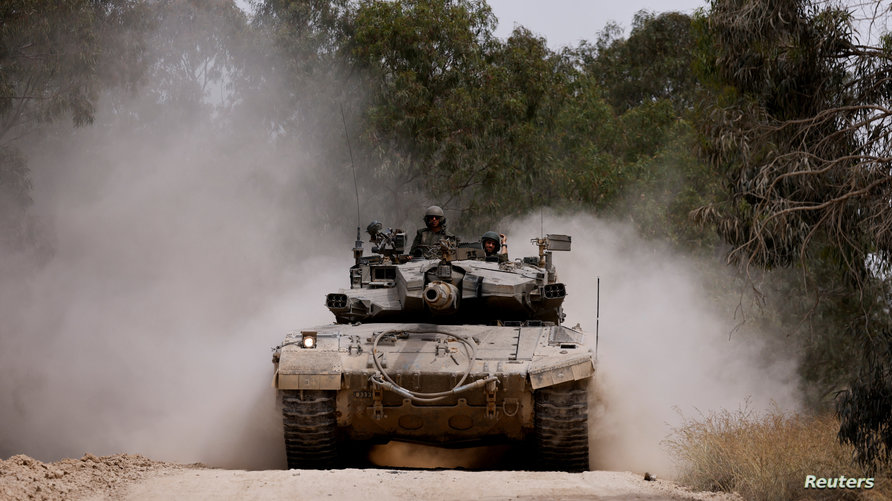 A tank manoeuvres near the Israel-Gaza border