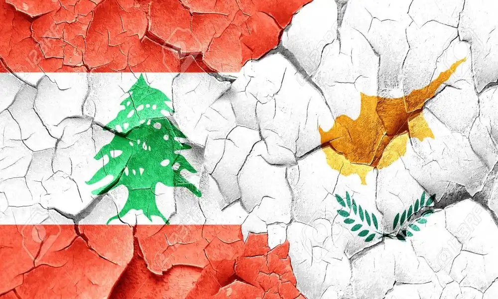 Lebanon flag with Cyprus flag on a grunge cracked wall