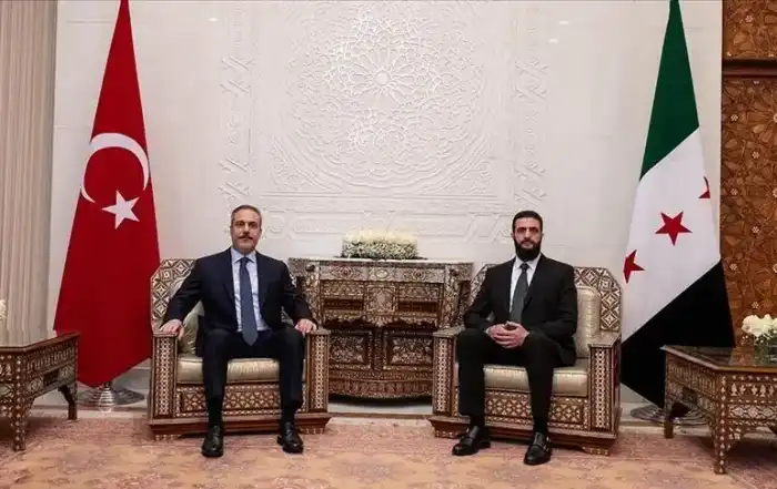 وزير الخارجية التركي هاكان فيدان وأحمد الشرع