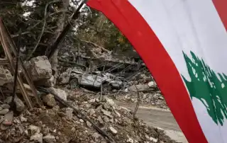 علم لبنان دمار جنوب