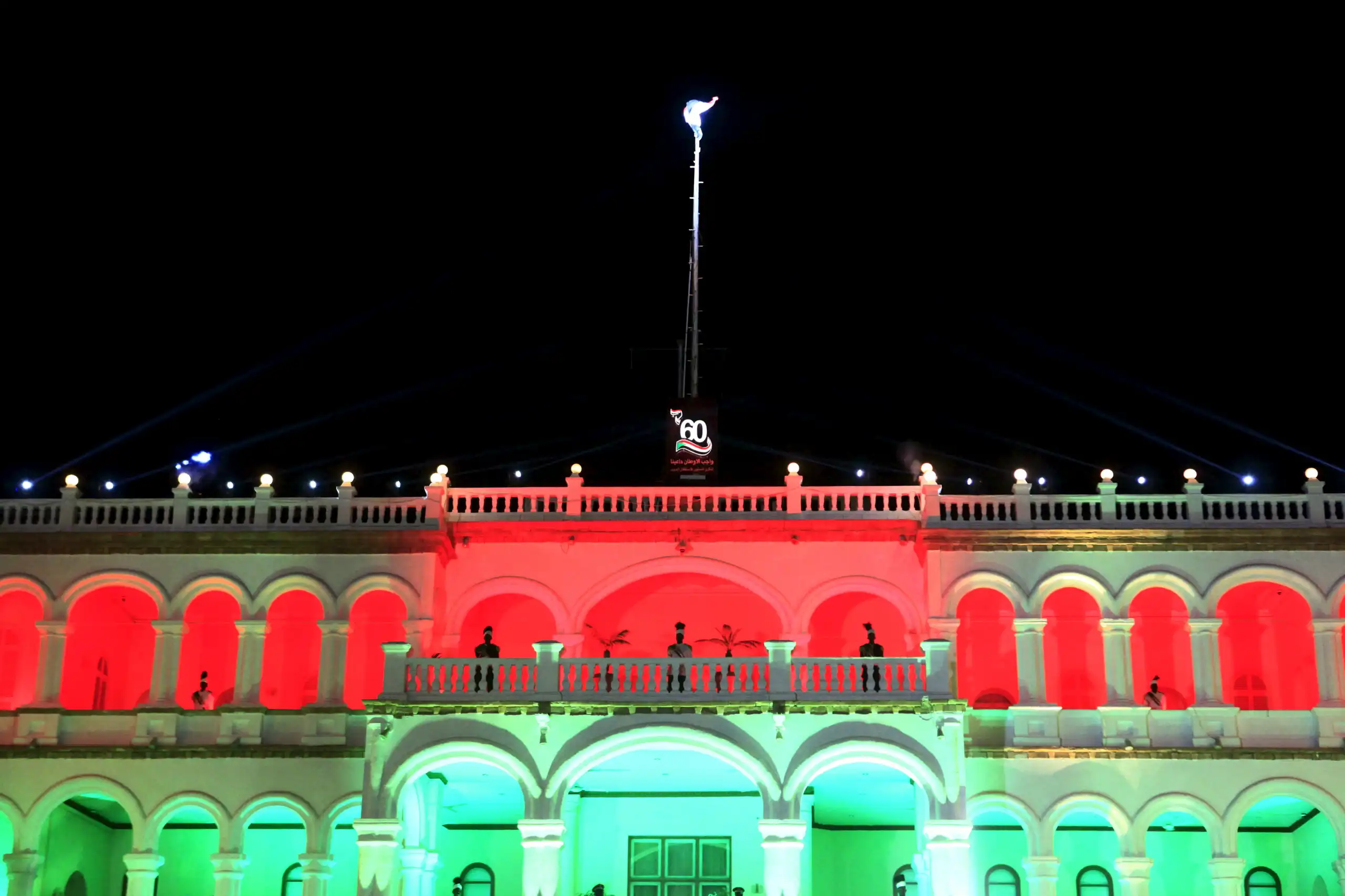 Guards of honour are seen at the presidential palace on the eve of the 60th anniversary of the nation’s Independence Day in Khartoum