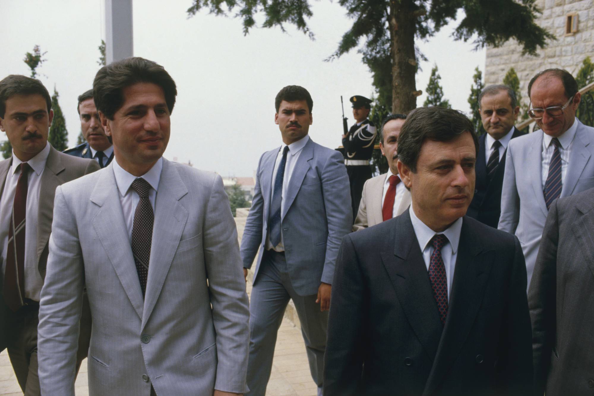 President Amine Gemayel (a Maronite Christian – left) leaves الجميل: خدام كان عصا يحركها الأسد… وأساليبه خبيثة ولئيمة