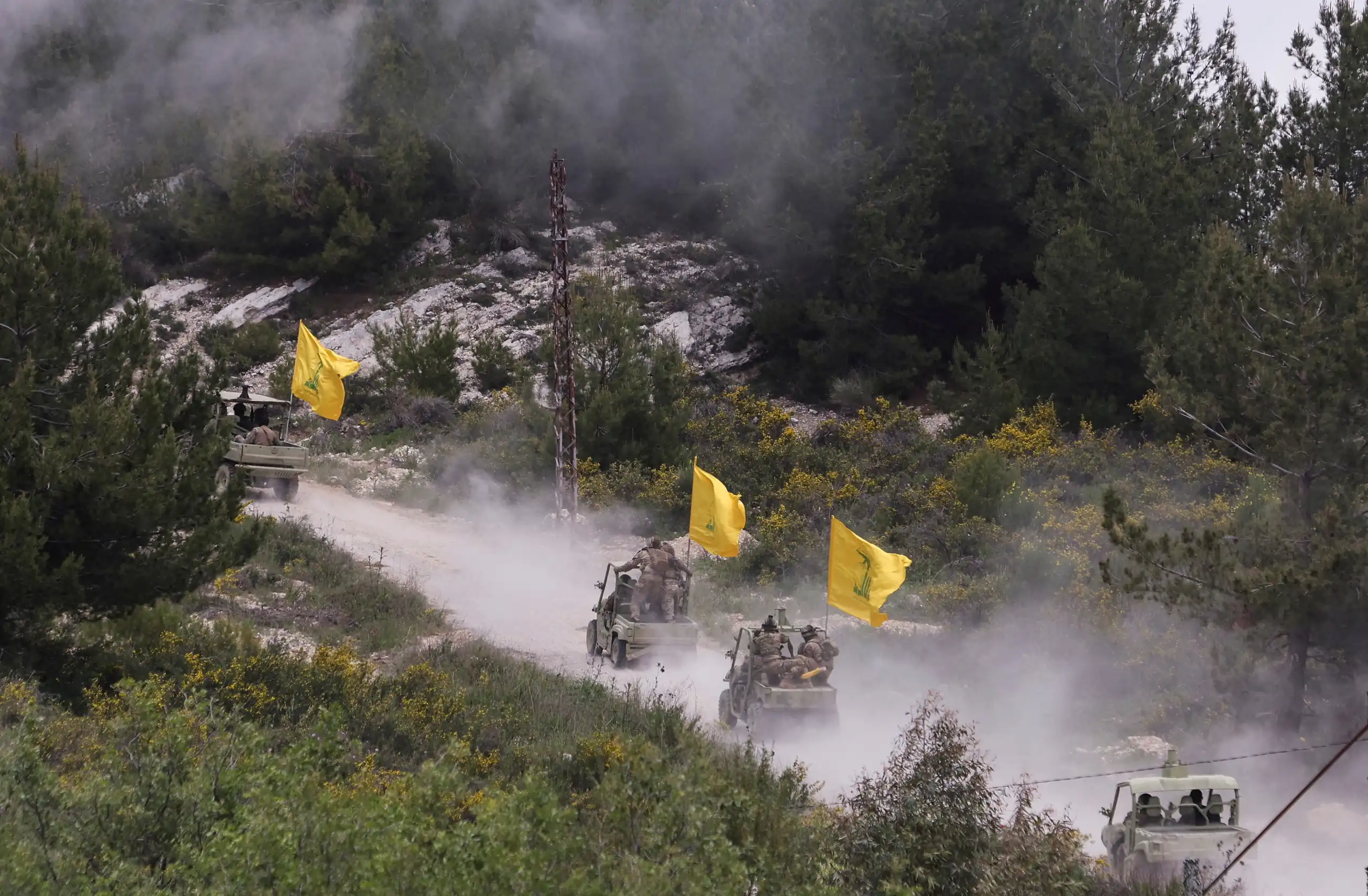 Hezbollah members take part in a military exercise during a media tour organized for the occasion of Resistance and Liberation Day, in Aaramta سلاح حزب الله اليات